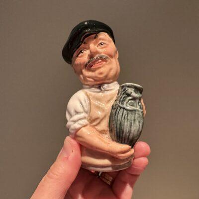 Royal Doulton 'Doultonville' Albert Sagger The Potter Candle Snuffer