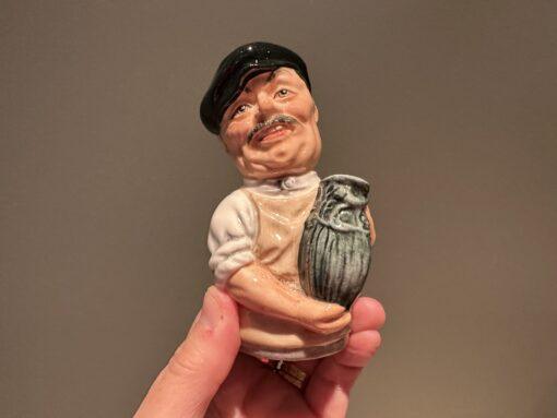 Royal Doulton 'Doultonville' Albert Sagger The Potter Candle Snuffer