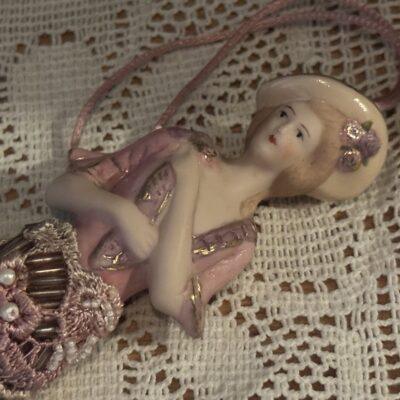 Porcelain Tassel Doll With Beaded Skirt And Gilt Trim